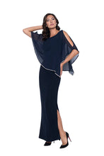 Load image into Gallery viewer, Make a dramatic entrance when you enter a room wearing our Novalie dress. Simply elegant describes this gorgeous gown by Frank Lyman for the Lyman Collection. A rich navy color knit with metallic sheen is enhanced with a sheer chiffon overlay edged with sparkling crystals. A perfect gown for those very special occasions, you will look and feel beautiful in this extraordinary dress.