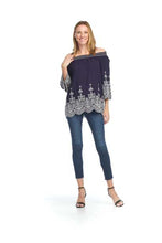 Load image into Gallery viewer, A magnificent eyelet design lines the bottom and sleeves of this gorgeous navy blue off the shoulder top. Scallop trim at the sleeve and bottom of our Patricia top adds even more beautiful detailing. You are sure to receive many compliments when you wear this stunning top.