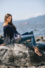 Load image into Gallery viewer, A magnificent eyelet design lines the bottom and sleeves of this gorgeous navy blue off the shoulder top. Scallop trim at the sleeve and bottom of our Patricia top adds even more beautiful detailing. You are sure to receive many compliments when you wear this stunning top.