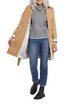Load image into Gallery viewer, A well-made and tailored trench coat is a wardrobe must have! The design of our Nedra trench coat is outstanding with its double-breasted design, tie belt, functional side pockets and shoulder straps. The extra details elevate this coat with a printed lining and tortoiseshell buckle and buttons. A coat that wonderfully pairs with everything in your closet and will transition from season to season, will become your favorite! Color- Nutmeg. Water-repellent. Tortoiseshell buckle and buttons.