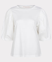 Load image into Gallery viewer, We love the elevated take on a simple t-shirt. The blouson sleeves are a spectacular feature on our Odelia, creating a feminine and stylish look. Be prepared to receive compliments when you style this top with your favorite bottom. Color- Off-white. Pull-over. Bodice is t-shirt stretch material. Sleeves are more of a crisp cotton fabrication. Fabric-100% Cotton.