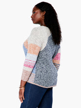 Load image into Gallery viewer, Just the right weight for the colder days of fall and winter, this gorgeous sweater will keep you cozy warm. We love the modern look of color blocks sewn together with intarsia knit. There's also some hidden detailing in the yarn itself, with flecks of darker shades running throughout. A classic crew neck, long sleeves, and a hem designed to sit at the hip completes the look. Color- Indigo multi-Gray, light blue, pink, coral, white. Pullover sweater. Intarsia knitting. Midweight.
