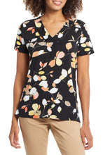 Load image into Gallery viewer, Let's hear it for comfy tees that go the extra style mile! We are crushing hard on this pretty printed top that's brimming with design details that elevate it to the next level—a flattering V-neck, relaxed fit, and side slits make it an effortless piece, while the ladder tape details add a dash of flair and make this a standout top that you'll want to wear everywhere your days take you.