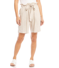 Load image into Gallery viewer, Casual yet polished, the Karen Kane Penelope Paperbag Waist Shorts feature a stylish ruffled paperbag waist with a belted tie and elastic waistband for adjustable comfort. Crafted from a soft linen-rayon blend, these shorts offer a relaxed fit and mid-thigh length, making them perfect for warm-weather outings. Front pockets add practicality to their chic design, while the natural beige color ensures versatile styling.