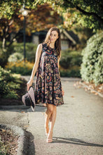 Load image into Gallery viewer, An ultra-comfortable A-line dress with style is a definite must have in your closet. The hot, humid days will be less challenging when you dress in our Elizabeth dress with its silky feel and satin look. Functional side pockets create an even more desirable dress. Pair with a denim jacket for an even more stylish look.