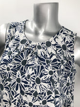 Load image into Gallery viewer, Daisies in navy, white and gray dance on this lovely sleeveless top by Papillon. The color combination makes it a very versatile top to pair with so many different bottoms from jeans to skirts and everything in-between.
