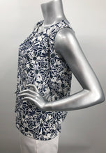 Load image into Gallery viewer, Daisies in navy, white and gray dance on this lovely sleeveless top by Papillon. The color combination makes it a very versatile top to pair with so many different bottoms from jeans to skirts and everything in-between.