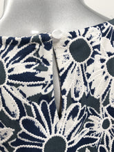 Load image into Gallery viewer, Daisies in navy, white and gray dance on this lovely sleeveless top by Papillon. The color combination makes it a very versatile top to pair with so many different bottoms from jeans to skirts and everything in-between.