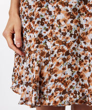 Load image into Gallery viewer, Our Patsy Pioneer Flower Ruffle Skirt is a darling skirt combining different colors from the EsQualo Spring/Summer collection. Knee length, with a bow and three buttons on the side you can easily dress up or wear casually.