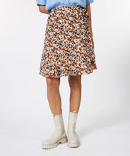 Load image into Gallery viewer, Our Patsy Pioneer Flower Ruffle Skirt is a darling skirt combining different colors from the EsQualo Spring/Summer collection. Knee length, with a bow and three buttons on the side you can easily dress up or wear casually.