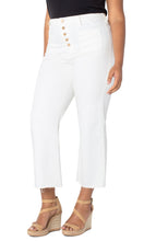 Load image into Gallery viewer, If you are looking for a fashionable and comfortable pair of jeans, look no further! So many details on our Sabra jean create a fresh and fun look! A high-rise jean, the row of exposed gold buttons really pops with interest against the whitewash jean. The wide leg style also has slight fray at the bottom of the legs which is all the fashion.