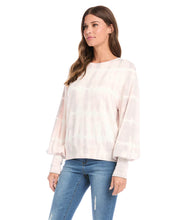 Load image into Gallery viewer, Update your athleisure wardrobe with this ultra-soft fleece knit top patterned in a cloudy tie-dye. It's detailed with billowy blouson sleeves.