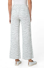 Load image into Gallery viewer, Sometimes, what you desire is just a casual and comfortable but fashionable outfit. Our Windam pull on pant in zebra print meets all those needs and more! With its soft fabrication, pull on ease, elastic waistband and drawstring closure, you can quickly get ready to face your day and run your errands.