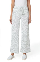 Load image into Gallery viewer, Sometimes, what you desire is just a casual and comfortable but fashionable outfit. Our Windam pull on pant in zebra print meets all those needs and more! With its soft fabrication, pull on ease, elastic waistband and drawstring closure, you can quickly get ready to face your day and run your errands.