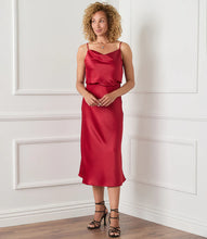 Load image into Gallery viewer, Cut from luxurious vintage heavy satin, this top is detailed with an alluring draped neckline. The perfect layering piece - soft, shimmering, and easy to dress up or down. Color- Choice of red or ivory. Adjustable straps. Lined. Vintage heavy satin.