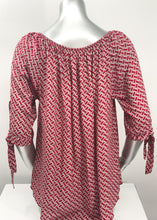 Load image into Gallery viewer, Our Rylee Raspberry Tie Sleeve Top is so versatile. With a raspberry and tan color geometric pattern, you create so many different looks with this lovely top. Pair with tan, white or black bottoms to create a dressier look or wear with jeans for a more casual look.