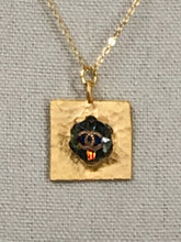 Load image into Gallery viewer, If you want a stylish piece of jewelry that is as unique as you are, our Skyla necklace fits that category. This dainty iridescent vintage CC button sits beautifully on a square gold pendant setting and hangs from a shiny gold necklace. The iridescent colors in the button flash with every move and catches the eye. 