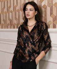 Load image into Gallery viewer, Shine and sparkle at your next event with this stunning sequin wrap over top. Just the perfect amount of stretch creates a comfortable fit. A beautiful style, our Sabine pairs perfectly with black pants. Combine with a pair of black faux leather pants and heels and you are party ready. Color- Black and bronze. Wrap over style. V-neck. Fabric- 100% Polyester.