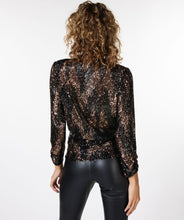 Load image into Gallery viewer, Shine and sparkle at your next event with this stunning sequin wrap over top. Just the perfect amount of stretch creates a comfortable fit. A beautiful style, our Sabine pairs perfectly with black pants. Combine with a pair of black faux leather pants and heels and you are party ready. Color- Black and bronze. Wrap over style. V-neck. Fabric- 100% Polyester.