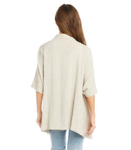 Load image into Gallery viewer, The Karen Kane Sabrina Jacket is a versatile layering piece crafted from a breathable linen-rayon blend. This stylish jacket features oversized lapels and a draped design for a chic finish. Its short sleeves and natural beige color make it perfect for pairing with a variety of tops, whether you're heading to lunch with friends or dressing up for work. Lightweight and comfortable, this jacket is a must-have addition to your wardrobe.