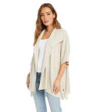 Load image into Gallery viewer, The Karen Kane Sabrina Jacket is a versatile layering piece crafted from a breathable linen-rayon blend. This stylish jacket features oversized lapels and a draped design for a chic finish. Its short sleeves and natural beige color make it perfect for pairing with a variety of tops, whether you're heading to lunch with friends or dressing up for work. Lightweight and comfortable, this jacket is a must-have addition to your wardrobe.