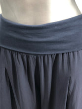 Load image into Gallery viewer, Our beautiful Nadia palazzo pant has an amazing knit fabric underneath a silk overlay. A flowy and relaxed fit gives this fabulous pant both style and comfort at the same time. Wear to the beach or to lunch, out to dinner, or a garden party or wear just lounge around the house, you can't go wrong with this stunning pant. Pair with our M Made In Italy silk tops for a complete fashionable look! Color- Navy. Boho, relaxed fit.