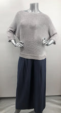Load image into Gallery viewer, A perfect sweater for all year round, as it is not too heavy and not too light, this knit sweater is fashionable and functional. The silver-gray color is so on trend and literally goes with so many different bottoms. As this 3/4 sleeve sweater is not a tight knit, it is slightly see-through. Wear over a bralette, tank or nude bra if preferred.