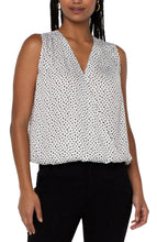 Load image into Gallery viewer, This classic dot printed top features a draped front for the most flattering fit. The V-neck design elevates the look of this lovely sleeveless top. A perfect top to match with so many different bottoms from jeans to dress pants. Create the perfect outfit when paired with our Black Sena Boyfriend Blazer with Princess Seams by Liverpool LA and our Black Kelsey Knit Trouser by Liverpool LA.