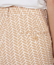 Load image into Gallery viewer, Our Skylar stretch block pants in sand color are simply darling. These pants are designed with side and buttoned back pockets and belt loops, while the block print creates a classic look.