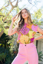 Load image into Gallery viewer, Our stunning pop of color Brea Sleeveles top is a must have in your summer wardrobe! Various shades of vibrant pinks, yellow, orange and olive-green outlined in black create a versatile look that can go from work to a night out. Pair with jeans, shorts or a skirt and a denim jacket, blazer or cardigan or just wear on its own. It truly is a piece that will make you feel happy every time you wear it, not to mention cool and comfortable during those hot days.