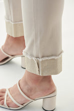 Load image into Gallery viewer, The latest in fashion is embellished and frayed jeans and our Christina Crystal Patch Jean by Joseph Ribkoff meets both of these trends. Patch embellishments in moonstone crystals can be found on both legs while slightly cuffed legs with moonstone embellishments dazzle with sparkle. Not your ordinary jean, this sand colored, soft denim jean will become your next favorite!