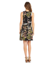 Load image into Gallery viewer, Whether you are going on vacation or going shopping and lunch with friends, this summer ready dress is the ideal style to wear. Designed in a tropical tone, the high neckline falls into a flattering A-line silhouette. Color- Black with tropical print in blue, green and pinks.