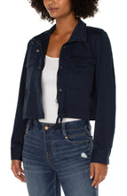 Load image into Gallery viewer, Liverpool's navy utility crop jacket, made with a stretch soft touch twill offers a modern take on a classic jacket. The design offers a touch of sass mixed with edge to give you styling versatility! Color- Federal Navy. Cropped. Collared. Double front patch pockets. Button and zip front closure. Button closure at wrists. Cinch waist drawstring.
