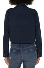 Load image into Gallery viewer, Liverpool's navy utility crop jacket, made with a stretch soft touch twill offers a modern take on a classic jacket. The design offers a touch of sass mixed with edge to give you styling versatility! Color- Federal Navy. Cropped. Collared. Double front patch pockets. Button and zip front closure. Button closure at wrists. Cinch waist drawstring.