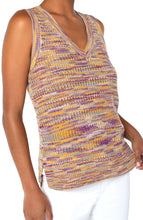 Load image into Gallery viewer, Our Quincy sleeveless sweater is lovely addition to any wardrobe. An excellent style to have on hand for every season, this gorgeous space dye sweater looks wonderful on its own or layered under your favorite jacket or cardigan. Speaking of cardigan, pair our Quincy with our matching CALLIE OPEN FRONT CARDIGAN IN GOLD, PURPLE AND TURQUOISE SPACE DYE for the perfect fashionista look! Color- Space dye; gold, purple, turquoise and white. Sleeveless. V-neck. Hi-low hem.