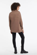 Load image into Gallery viewer, Take vegan leather and Ponte fabric, combine and you get a pair of leggings with an elevated look. A versatile style, these leggings will go with so many of your favorite wardrobe pieces including sweaters and jackets. These spectacular leggings will easily become your next favorite! Color-Black. Pull-on elastic waistband. Fitted legging. 10 1/4" mid-rise.