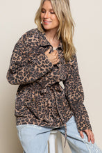 Load image into Gallery viewer, If you are looking for something new with a vintage vibe, our Virginia jacket is the perfect transitional jacket for you. Designed with a relaxed fit, the Virginia jacket has a hidden placket and zipper closure on center front and a great leopard print. Comes with a four-pouch pocket on front with an adjustable strap on the waistband and finished with distressed detail throughout the garment for vintage look. Color-Light brown base with black leopard print. Relaxed fit; no stretch.