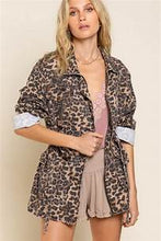 Load image into Gallery viewer, If you are looking for something new with a vintage vibe, our Virginia jacket is the perfect transitional jacket for you. Designed with a relaxed fit, the Virginia jacket has a hidden placket and zipper closure on center front and a great leopard print. Comes with a four-pouch pocket on front with an adjustable strap on the waistband and finished with distressed detail throughout the garment for vintage look. Color-Light brown base with black leopard print. Relaxed fit; no stretch.