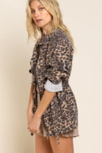 Load image into Gallery viewer, If you are looking for something new with a vintage vibe, our Virginia jacket is the perfect transitional jacket for you. Designed with a relaxed fit, the Virginia jacket has a hidden placket and zipper closure on center front and a great leopard print. Comes with a four-pouch pocket on front with an adjustable strap on the waistband and finished with distressed detail throughout the garment for vintage look. Color-Light brown base with black leopard print. Relaxed fit; no stretch.