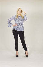 Load image into Gallery viewer, A gorgeous Mandala textured print comes alive on this fabulous bell sleeve top. A beautiful white print pops on a navy sheer fabric, making this a very versatile top. Perfect paired with white bottoms or jeans and easily goes from day wear to an evening out. Colors- White and Navy. Mandala textured print. Bell Sleeve. Slight Hi-lo design. Slightly longer in the back.