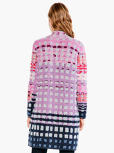 Load image into Gallery viewer, We love this dual-purpose coat/cardigan and the amazing pops of color that it offers. Our Willa coatigan can be worn as a cardigan or a coat, depending on the day and your mood. Full of novelty yarns with poppy textures (we love the grey yarn's extra fuzziness) this long party coatigan is perfect for cold-weather gatherings. Our Willa has a button front, mock collar, and a surprisingly soft, and entirely welcome, drapey feel.