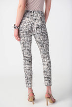 Load image into Gallery viewer, Constructed from premium millennium fabric, these pull-on pants boast a sophisticated slim fit and are adorned with a striking abstract print. The refined faux fly and practical side pockets add to the overall polished aesthetic.  Color- Vanilla/Multi. Millennium fabric. Waistband with loops. Side pockets. Fake fly. Unlined.
