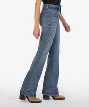 Load image into Gallery viewer, Experience the perfect blend of vintage and modern with Ana High Rise Flare jeans by Kut from the Kloth. Crafted from stretch-denim, these jeans feature vertical seams, kickout at the knees finished with wide hems for a stylish twist. Color: Custom with dark stone wash. True to size fit. High rise. Flare design. Front seams. Two button closure.
