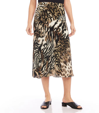 This midi skirt flaunts an eye-catching animal print and offers a slim silhouette that moves gracefully. Its pull-on waistband provides effortless wearing. Pairs beautifully with a solid black top or our   Color -Shadow Animal Print Side pockets. Lined. Fabric - 100% Viscose. Care- Dry clean.