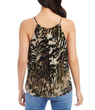 Load image into Gallery viewer, Constructed from georgette fabric, this stylish top is adorned with an animal print and boasts a halter neckline, sleeveless design, spaghetti straps, and a loose fit. This versatile piece is sure to add a fashionable touch to any outfit, from jeans to skirts, and is perfect for layering beneath a jacket.
