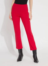 Load image into Gallery viewer, The Ankle Elysse, with its shorter 27.5-inch inseam, is an ideal fit-and-flare pant for shorter women. Crafted from 4-way stretch Ponte fabric, it gracefully contours the hips and thighs, then flares at the leg. Featuring a concealed patented waistband and front pintucks, its stunning deep red hue is sure to make a statement.
