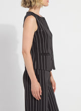 Load image into Gallery viewer, Model wearing a black pinstripe sleeveless vest and matching pants on a white background.
