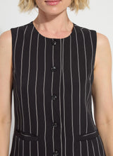 Load image into Gallery viewer, Model wearing a black pinstripe sleeveless vest on a white background.
