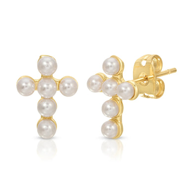 hese Baby Vivi cross studs are perfect earrings. Large enough to stand out but delicate with its pearl detail, these earrings give you that extra pop to your wardrobe.  Color- White and gold. White pearls.  14k gold plated.