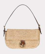 Load image into Gallery viewer, Woven handbag with a brown strap and gold buckle against a light gray background.

